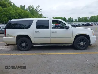 2011 GMC Yukon XL Denali z VIN 1GKS2MEF2BR190877, wystawiony jako IAAI lot #42364202 z przebiegiem 160 063 mil mil oraz . Historia ofert i sprzedaży dostępna na DreamBid. Obrazek 13.