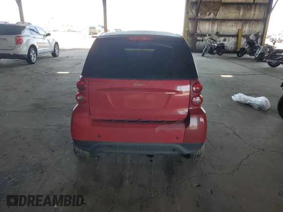 2013 Smart fortwo Pure with VIN WMEEJ3BA2DK663995, listed as a Copart auction lot 54629895 with Not Provided miles and Salvage Title. Bid and sale history available at DreamBid. Image 6.