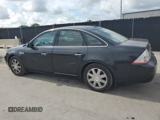 2008 Ford Taurus Limited with VIN 1FAHP25W78G128851, listed as a Copart auction lot 61254015 with 216,335 mi miles and Salvage title. Bid and sale history available at DreamBid. Image 2.