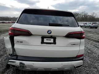 2021 BMW X5 sDrive40i with VIN 5UXCR4C04M9E30879, listed as a Copart auction lot 39577953 with 19,276 mi miles. Bid and sale history available at carsss.com. Image 6.