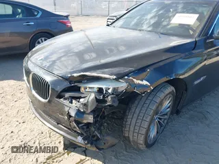2012 BMW 7 Series 740i with VIN WBAKA4C51CC613636, listed as a IAAI auction lot 41908801 with 127,725 mi miles and . Bid and sale history available at carsss.com. Image 6.