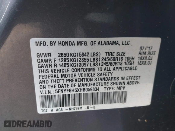 2017 Honda Pilot EX-L with VIN 5FNYF6H5XHB059834, listed as a IAAI auction lot 41670003 with 58,285 mi miles and . Bid and sale history available at DreamBid. Image 9.