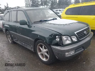 2000 Lexus LX with VIN JT6HT00W3Y0124104, listed as a IAAI auction lot 41493749 with 253,161 mi miles. Bid and sale history available at carsss.com. Image 1.