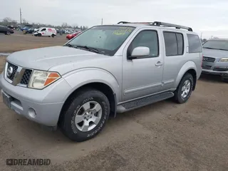 2006 Nissan Pathfinder SE with VIN 5N1AR18U46C604709, listed as a IAAI auction lot 41735976 with 123,548 mi miles. Bid and sale history available at carsss.com. Image 2.