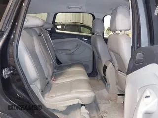 2014 Ford Escape Titanium with VIN 1FMCU9J95EUD85537, listed as a IAAI auction lot 41472236 with 154,796 mi miles. Bid and sale history available at carsss.com. Image 8.