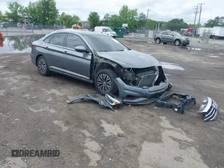 2019 Volkswagen Jetta SEL z VIN 3VWE57BU3KM062523, wystawiony jako IAAI lot #42107785 z przebiegiem 75 735 mil mil oraz . Historia ofert i sprzedaży dostępna na DreamBid. Obrazek 1.