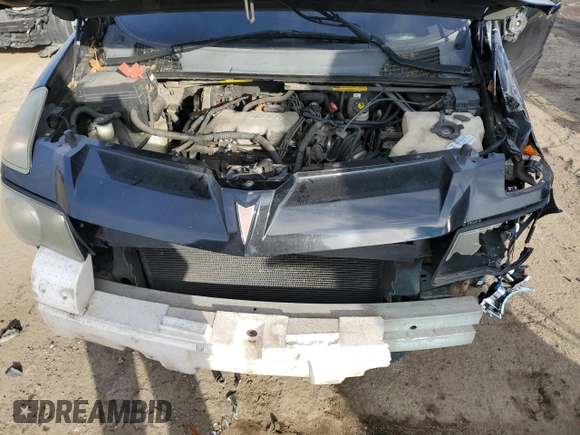 2002 Pontiac Aztek z VIN 3G7DA03E22S584224, wystawiony jako Copart lot #87851655 z przebiegiem 218 653 mil mil oraz Szkoda całkowita • Salvage title. Historia ofert i sprzedaży dostępna na DreamBid. Obrazek 12.