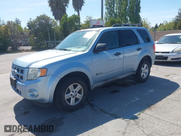 2009 Ford Escape Hybrid with VIN 1FMCU49319KB30484, listed as a IAAI auction lot 42160753 with 104,669 mi miles and . Bid and sale history available at DreamBid. Image 2.