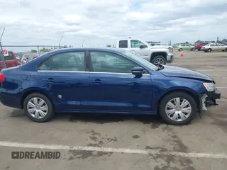 2013 Volkswagen Jetta SE with VIN 3VWDP7AJ0DM223801, listed as a IAAI auction lot 42132060 with 129,652 mi miles and . Bid and sale history available at DreamBid. Image 14.