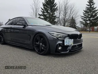 2015 BMW 4 Series 435i xDrive with VIN WBA3R5C55FK371639, listed as a Copart auction lot 56732715 with 122,559 mi miles and Clean title. Bid and sale history available at DreamBid. Image 2.