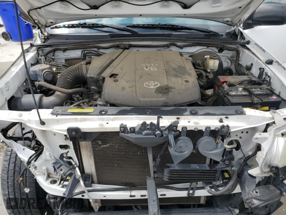 2014 Toyota Tacoma PreRunner с VIN 3TMJU4GN2EM169152, выставлен на аукционе Copart как лот 58742885 с пробегом 147 674 миль миль и Списание • Salvage title. История ставок и продаж доступна на DreamBid. Изображение 11.