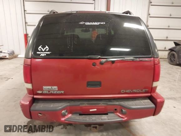 2000 Chevrolet Blazer LT z VIN 1GNDT13W1Y2358746, wystawiony jako IAAI lot #41541071 z przebiegiem 205 532 mil mil oraz . Historia ofert i sprzedaży dostępna na DreamBid. Obrazek 16.