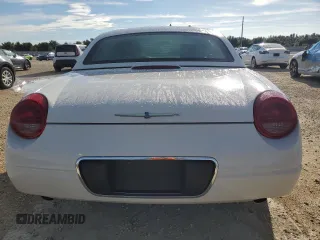 2002 Ford Thunderbird Hardtop Premium z VIN 1FAHP60A92Y103048, wystawiony jako Copart lot #73916924 z przebiegiem 75 396 mil mil oraz Szkoda całkowita • Salvage title. Historia ofert i sprzedaży dostępna na DreamBid. Obrazek 6.