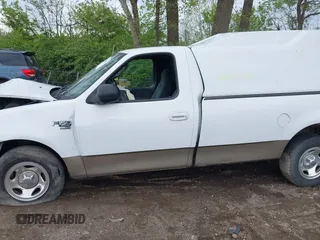 2003 Ford F-150 XL with VIN 1FTRF17L23NB95487, listed as a IAAI auction lot 42154868 with 187,000 mi miles and . Bid and sale history available at DreamBid. Image 14.