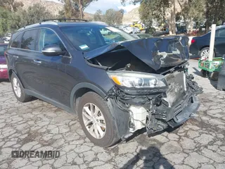 2017 Kia Sorento LX V6 with VIN 5XYPG4A52HG228342, listed as a IAAI auction lot 41430702 with 135,131 mi miles. Bid and sale history available at carsss.com. Image 1.