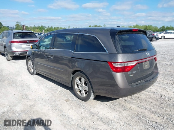 2012 Honda Odyssey Touring с VIN 5FNRL5H93CB133288, выставлен на аукционе IAAI как лот 42020622 с пробегом 184 077 миль миль и . История ставок и продаж доступна на DreamBid. Изображение 3.
