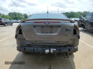 2010 Ford Fusion SE with VIN 3FAHP0HA4AR387638, listed as a Copart auction lot 60649585 with 210,779 mi miles and Salvage title. Bid and sale history available at DreamBid. Image 6.