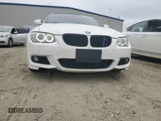 2012 BMW 3 Series 335i with VIN WBAKG7C58CE803258, listed as a Copart auction lot 71809764 with 73,376 mi miles and Salvage Title. Bid and sale history available at carsss.com. Image 5.