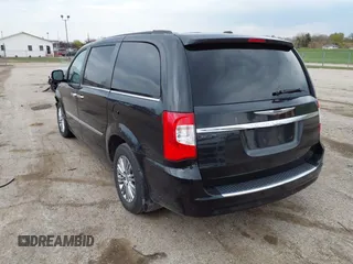 2014 Chrysler Town & Country Touring-L with VIN 2C4RC1CG6ER176156, listed as a IAAI auction lot 42008100 with 139,519 mi miles. Bid and sale history available at carsss.com. Image 3.