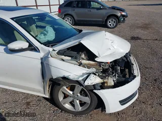 2013 Volkswagen Passat SE w/Sunroof with VIN 1VWBH7A31DC007320, listed as a IAAI auction lot 41213664 with 164,040 mi miles. Bid and sale history available at carsss.com. Image 13.