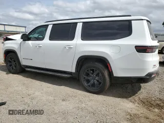 2024 Jeep Wagoneer Series II Carbide with VIN 1C4SJSBP2RS118483, listed as a Copart auction lot 45696995 with 12,101 mi miles and Salvage Title. Bid and sale history available at DreamBid. Image 2.