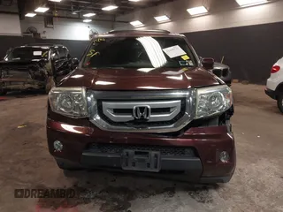 2009 Honda Pilot EX-L with VIN 5FNYF48569B021586, listed as a IAAI auction lot 41609721 with 291,598 mi miles. Bid and sale history available at carsss.com. Image 12.