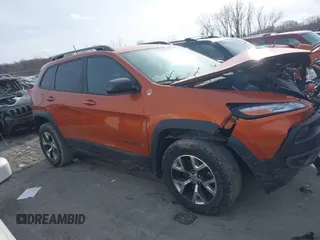 2015 Jeep Cherokee Trailhawk with VIN 1C4PJMBB3FW642266, listed as a IAAI auction lot 41510571 with 72,030 mi miles and . Bid and sale history available at DreamBid. Image 13.