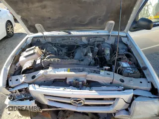 2002 Mazda B-Series 2WD Truck DS with VIN 4F4YR16U82TM03063, listed as a Copart auction lot 80309714 with 133,352 mi miles and Salvage Title. Bid and sale history available at carsss.com. Image 11.