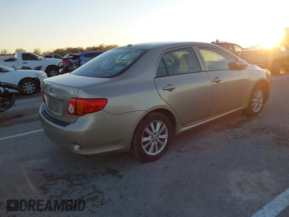 2009 Toyota Corolla with VIN 1NXBU40E59Z164488, listed as a IAAI auction lot 40907058 with 180,161 mi miles. Bid and sale history available at carsss.com. Image 4.