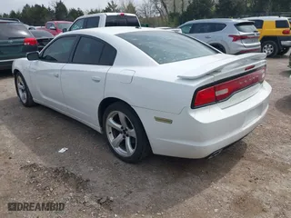 2013 Dodge Charger SXT Plus with VIN 2C3CDXHG8DH614862, listed as a IAAI auction lot 41874630 with 156,213 mi miles. Bid and sale history available at carsss.com. Image 3.