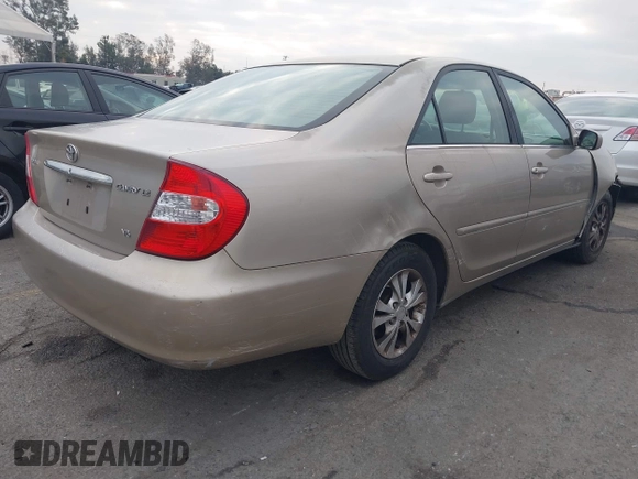 2004 Toyota Camry LE with VIN 4T1BF32K44U069081, listed as a IAAI auction lot 41460767 with 204,992 mi miles and . Bid and sale history available at carsss.com. Image 4.