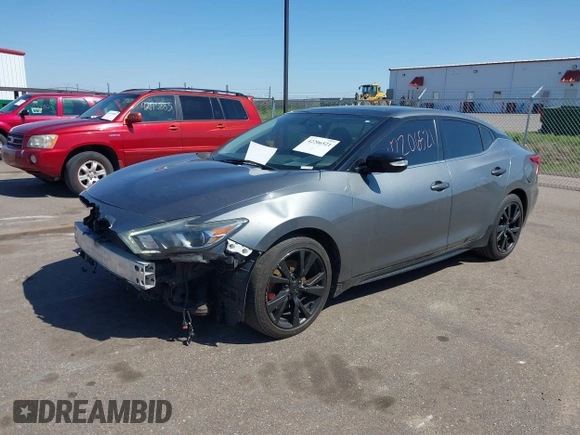2018 Nissan Maxima SL with VIN 1N4AA6AP9JC360485, listed as a IAAI auction lot 42206521 with 140,898 mi miles and . Bid and sale history available at DreamBid. Image 19.