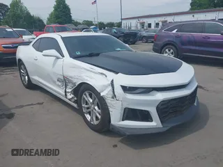 2015 Chevrolet Camaro LS z VIN 2G1FB1E35F9179835, wystawiony jako IAAI lot #42091468 z przebiegiem 100 770 mil mil oraz . Historia ofert i sprzedaży dostępna na DreamBid. Obrazek 1.