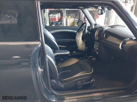 2008 MINI Cooper Hardtop S with VIN WMWMF73568TT87273, listed as a IAAI auction lot 41996859 with 107,671 mi miles. Bid and sale history available at carsss.com. Image 5.