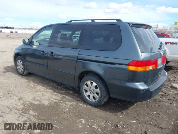 2003 Honda Odyssey EX-L with VIN 5FNRL18903B090800, listed as a IAAI auction lot 41843858 with 201,393 mi miles and . Bid and sale history available at DreamBid. Image 3.