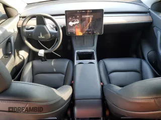 2022 Tesla Model Y Long Range with VIN 7SAYGAEE7NF376795, listed as a Copart auction lot 55113135 with 66,796 mi miles and Salvage Title. Bid and sale history available at carsss.com. Image 8.