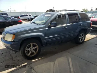 2003 Jeep Grand Cherokee Limited z VIN 1J8GW58N73C605929, wystawiony jako Copart lot #70755024 z przebiegiem 173 147 mil mil oraz Szkoda całkowita • Salvage title. Historia ofert i sprzedaży dostępna na DreamBid. Obrazek 1.