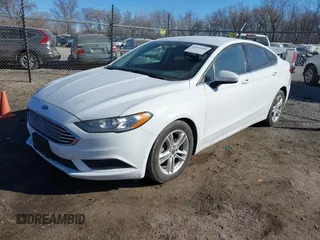 2018 Ford Fusion SE with VIN 3FA6P0H75JR171339, listed as a IAAI auction lot 41445890 with 76,731 mi miles. Bid and sale history available at carsss.com. Image 2.