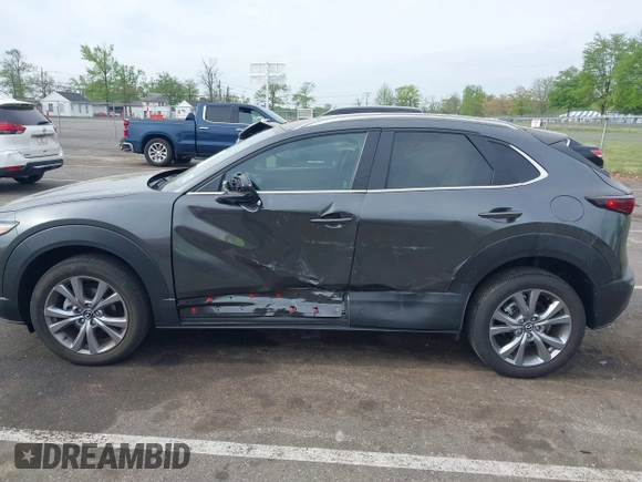 2024 Mazda CX-30 S Carbon Edition with VIN 3MVDMBCM5RM665341, listed as a IAAI auction lot 42180459 with 4,496 mi miles and . Bid and sale history available at DreamBid. Image 6.