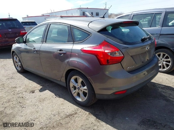 2013 Ford Focus SE with VIN 1FADP3K21DL341530, listed as a IAAI auction lot 41764922 with 208,452 mi miles. Bid and sale history available at carsss.com. Image 3.