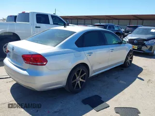 2015 Volkswagen Passat 1.8T Limited Edition with VIN 1VWAT7A30FC014689, listed as a IAAI auction lot 41758748 with 140,545 mi miles. Bid and sale history available at carsss.com. Image 4.