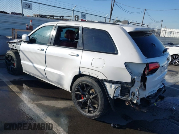 2017 Jeep Grand Cherokee SRT with VIN 1C4RJFDJ7HC600227, listed as a IAAI auction lot 41390600 with 96,841 mi miles. Bid and sale history available at carsss.com. Image 3.