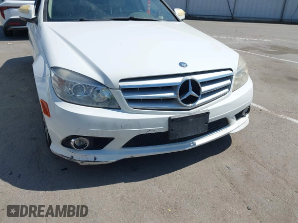 2009 Mercedes-Benz C-Class 3.0L Sport with VIN WDDGF54X09F233877, listed as a IAAI auction lot 42121123 with 215,698 mi miles. Bid and sale history available at carsss.com. Image 12.