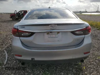 2016 Mazda 6 i Grand Touring с VIN JM1GJ1W53G1434499, выставлен на аукционе Copart как лот 54739745 с пробегом Не указан миль и Списание • Salvage title. История ставок и продаж доступна на DreamBid. Изображение 6.