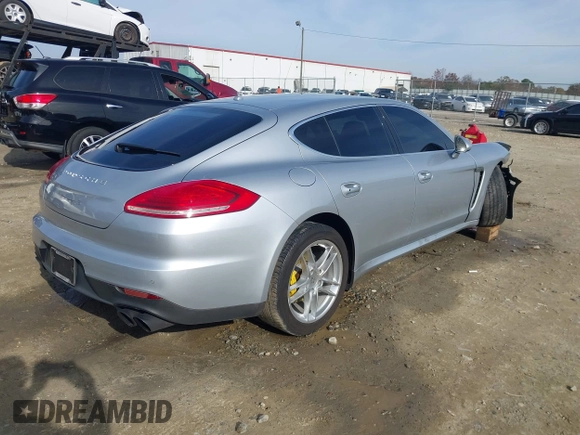 2015 Porsche Panamera 4S z VIN WP0AB2A70FL050779, wystawiony jako IAAI lot #40977292 z przebiegiem 78 574 mil mil oraz . Historia ofert i sprzedaży dostępna na DreamBid. Obrazek 4.