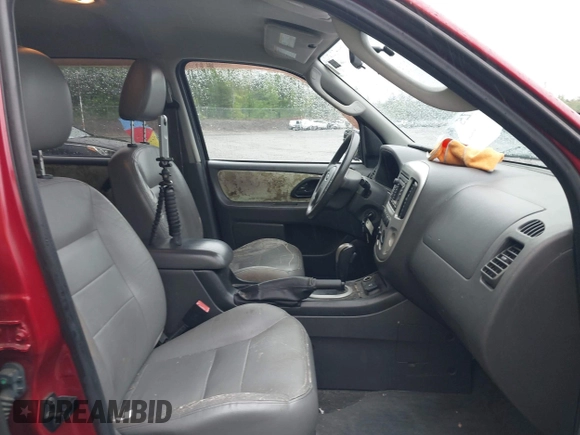 2005 Ford Escape Hybrid with VIN 1FMCU96H95KC81872, listed as a IAAI auction lot 42292225 with 165,259 mi miles and . Bid and sale history available at DreamBid. Image 5.