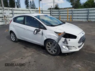 2019 Ford Fiesta SE z VIN 3FADP4EJ5KM106732, wystawiony jako Copart lot #55856145 z przebiegiem 79 778 mil mil oraz Szkody całkowita. Historia ofert i sprzedaży dostępna na DreamBid. Obrazek 4.