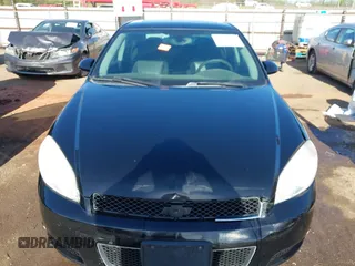 2012 Chevrolet Impala LTZ with VIN 2G1WC5E39C1280827, listed as a IAAI auction lot 41979470 with 153,669 mi miles and . Bid and sale history available at DreamBid. Image 12.