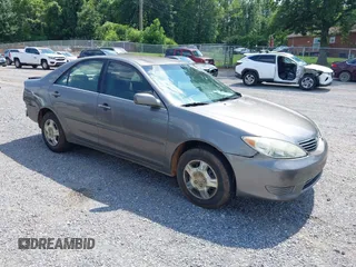 2006 Toyota Camry STD with VIN 4T1BE32K66U659871, listed as a IAAI auction lot 42673701 with 255,352 mi miles and . Bid and sale history available at DreamBid. Image 1.