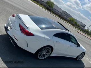2019 Mercedes-Benz CLS with VIN WDD2J5JB0KA015104, listed as a IAAI auction lot 42108693 with 59,102 mi miles. Bid and sale history available at carsss.com. Image 4.